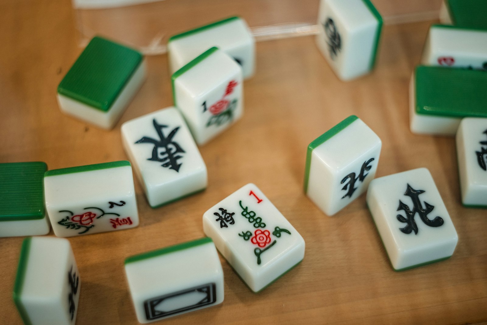 Mahjong tiles on a wooden table