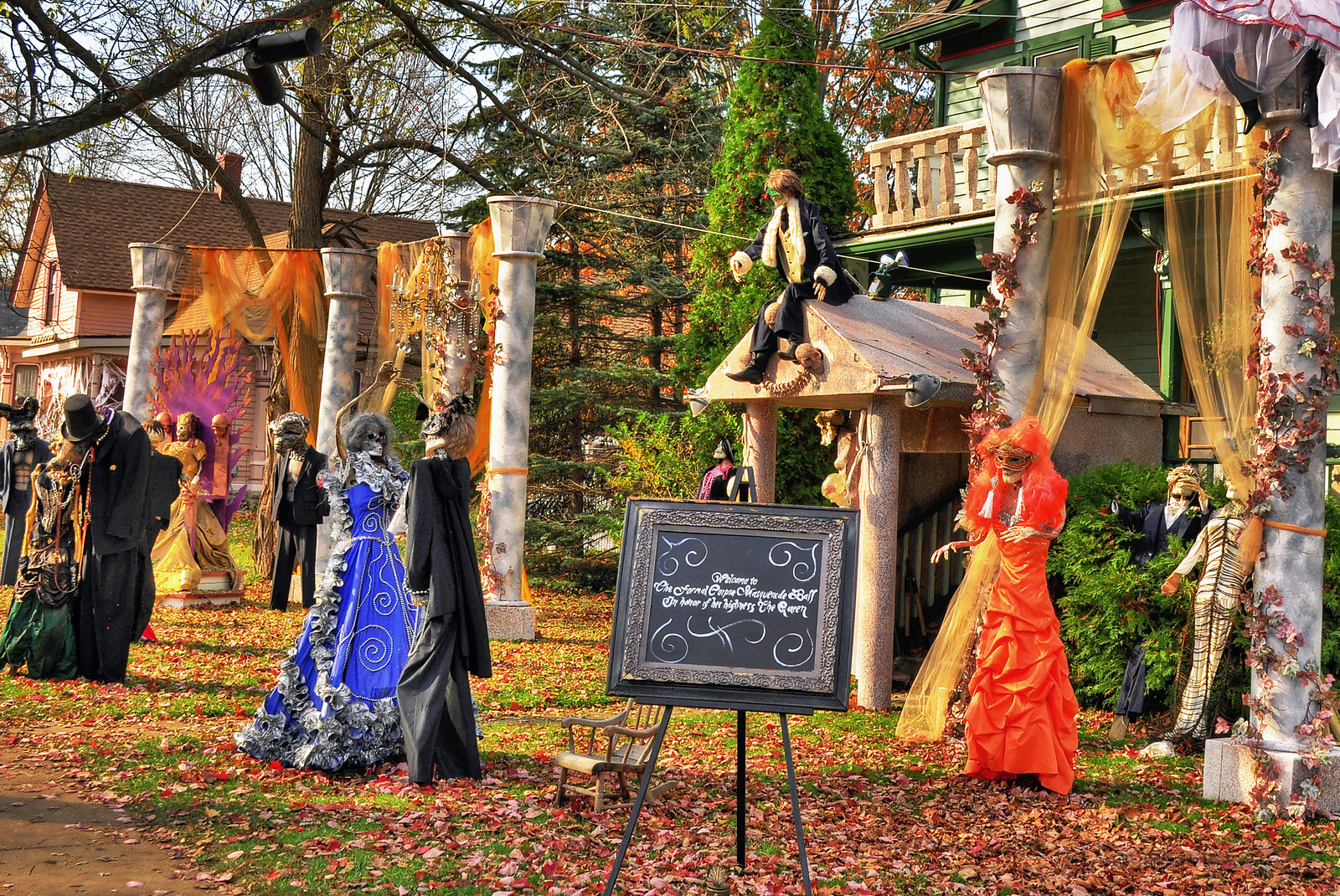 Skeleton masquerade ball display in a Tillson Street front yard in Romeo, Michigan